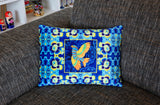 'Blue folk bird' velvet cushion