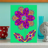 'Flower cutout on green' card
