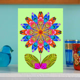 'Flower cutout on pale green' card